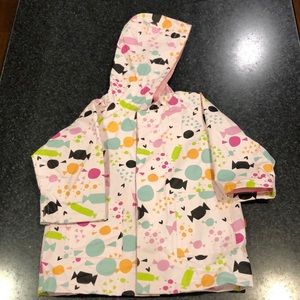 Adorable waterproof rain coat with magnet closure